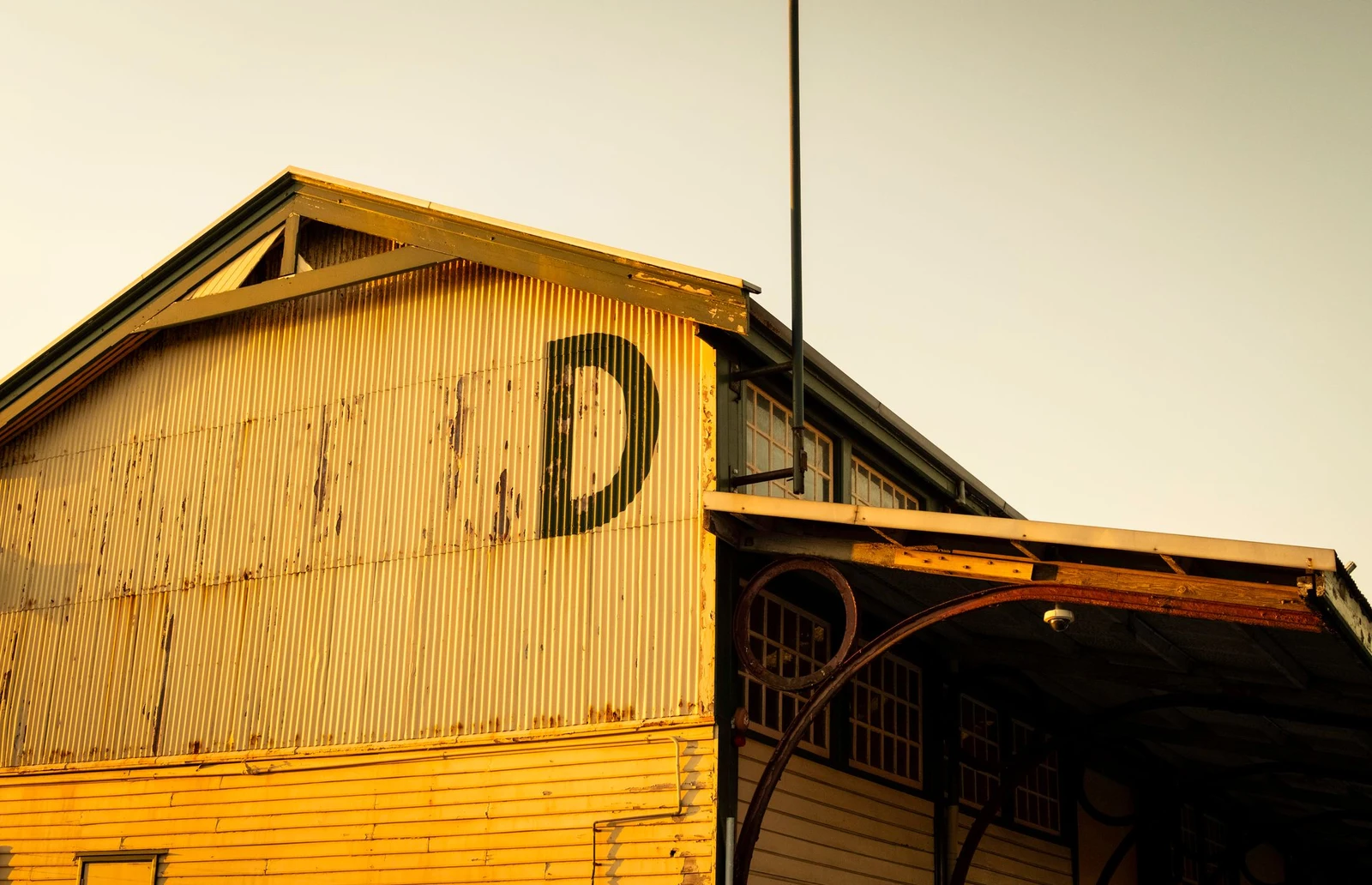 Industrial warehouse exterior in warm sunlight in Fremantle, Western Australia